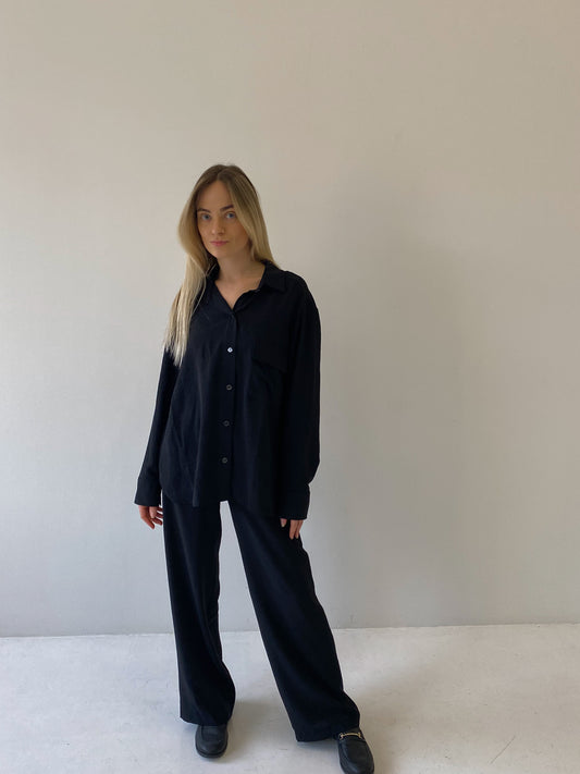 Juodos plačios kelnės su guma